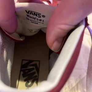 Maroon classic high top vans.